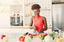 a beautiful young sister preparing Nutrition for her fit and healthy lean body to teach her audience